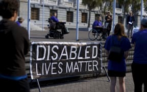 Disability campaigners presented a petition and a box full of stories asking the government to listen on 23 March 2021.