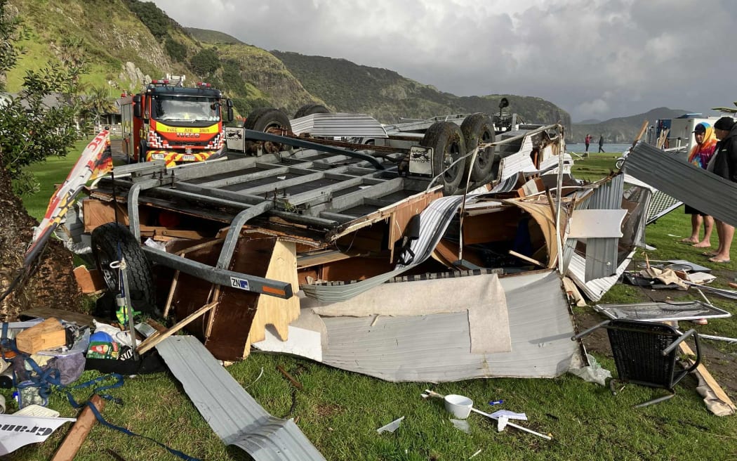 Phil Wallan’s caravan was destroyed when it was blown more than 60m into a tree by a suspected tornado.