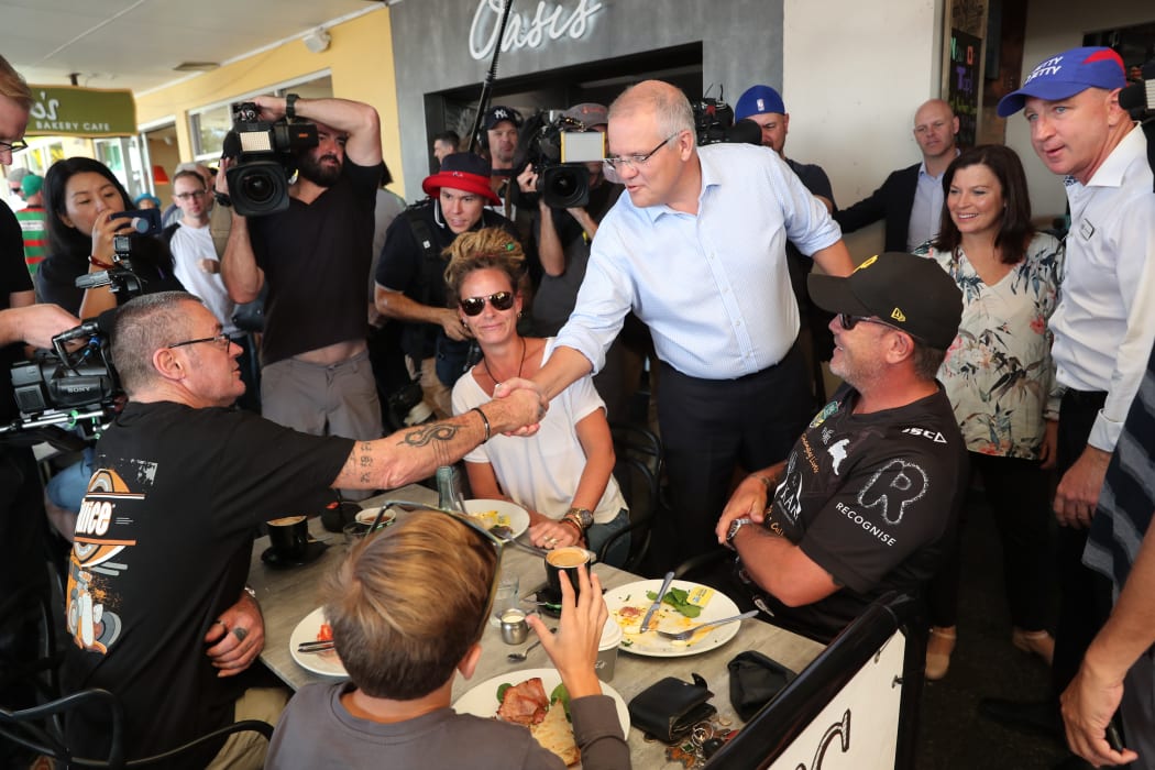 Australia's Prime Minister Scott Morrison greets supporters at an election launch rally in Brisbane.