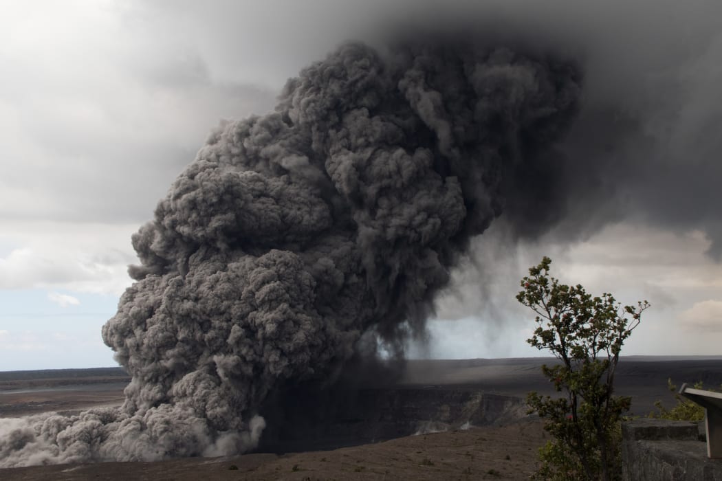 This US Geological Survey (USGS) image released May 15, 2018, shows an ash plume rising following a massive volcano eruption on Kilauea volcano in Hawaii.