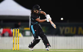 Amelia Kerr of New Zealand plays a shot