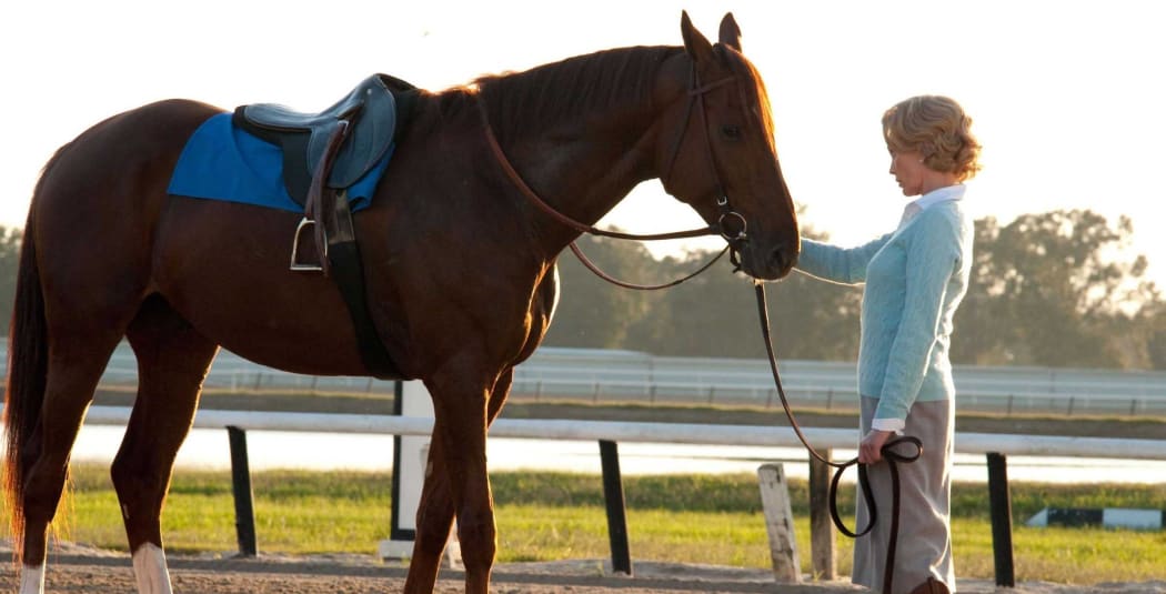 The horse playing Secretariat and Diane Lane in Secretariat (2011).