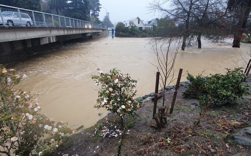 The Aratuna Bridge on Bridge Street, Nelson earlier this afternoon. The river level has dropped significantly since Wednesday's peak but is still in full flood.