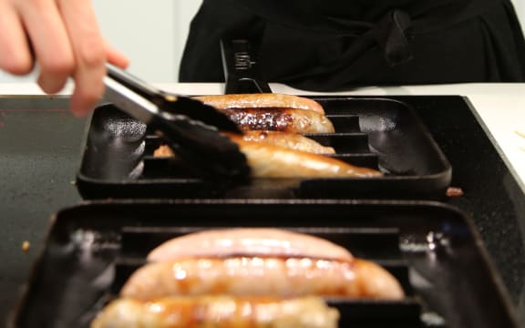 Sausages are cooked up for judges.