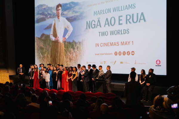 Marlon Williams' whānau from Tōrere deliver a waiata tautoko at the world premiere of Ngā Ao E Rua – Two Worlds.