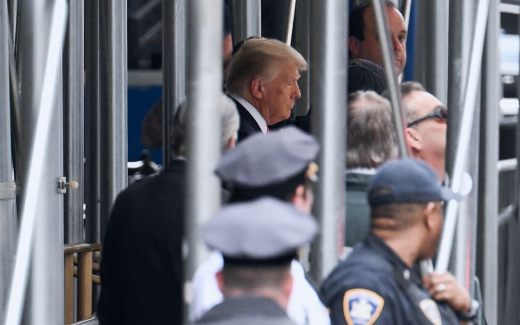 Former US president Donald Trump leaves the Manhattan Criminal Court in New York City on April 4, 2023. - Former US President Donald Trump is to be booked, fingerprinted, and will have a mugshot taken at a Manhattan courthouse on the afternoon of April 4, 2023, before appearing before a judge as the first ever American president to face criminal charges. (Photo by ANDREW CABALLERO-REYNOLDS / AFP)