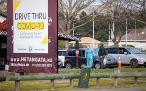 People wait to get tested at the Pages Road drive-through testing in Christchurch