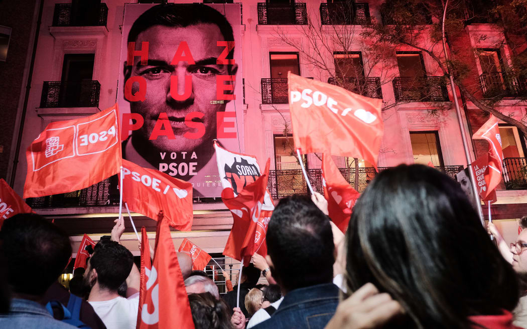 Prime Minister of Spain Pedro Sanchez addresses supporters outside of the Spanish Socialist Workers’s Party headquarters.