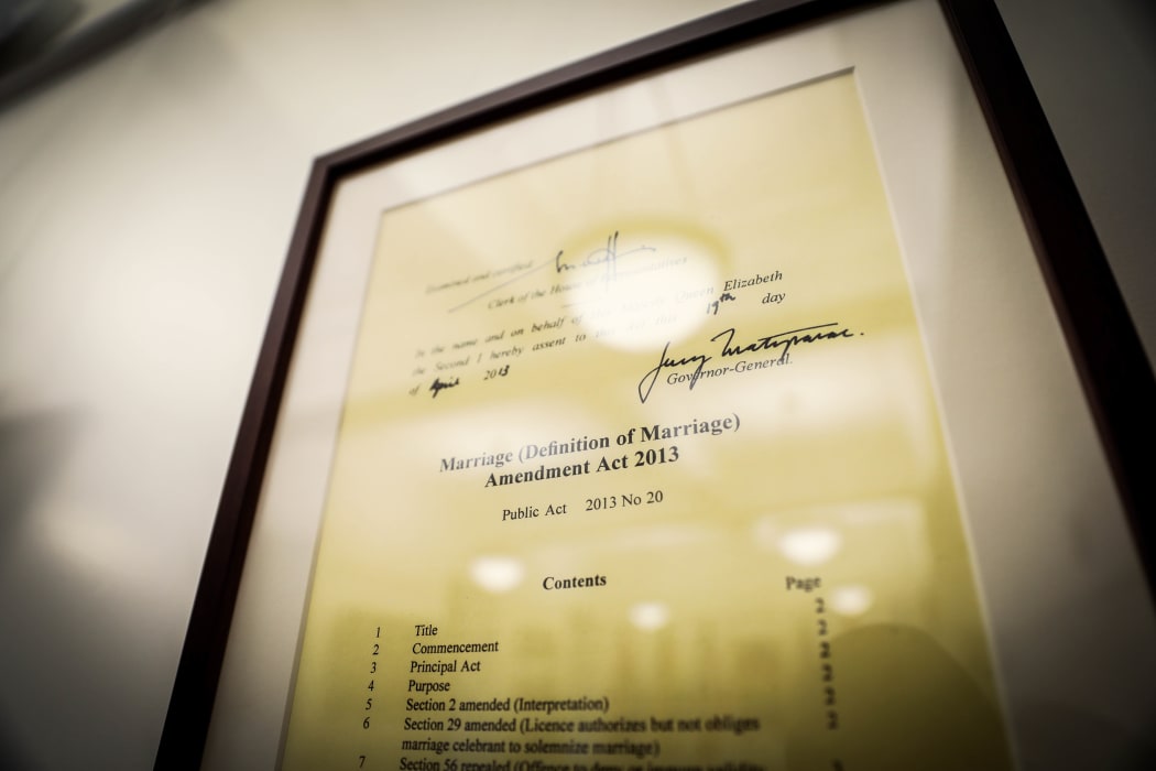 A framed copy of Governor General's signature on Louisa Wall's marriage equality bill on the wall of the Rainbow Room.