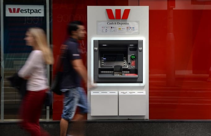 People walk past a Westpac ATM in Sydney