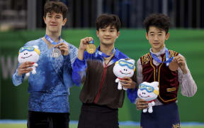 Medal Ceremony for Figure Skating Men Single Skating - Free Skating at the Gangneung Ice Arena with Silver Medallist Adam Hagara SVK, Gold Medallist Kim Hyungyeom KOR and Bronze Medallist Yanhao Li NZL.