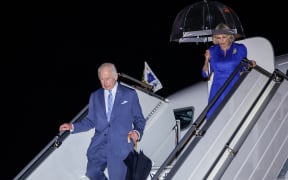 Britain's King Charles III and Queen Camilla arrive at Sydney International Airport in Sydney on October 18, 2024, for a six-day royal visit to Sydney and Canberra. (Photo by Brook Mitchell / POOL / AFP)