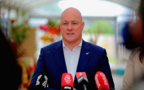 Prime Minister Christopher Luxon speaks after a visit to an Auckland school.