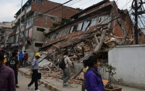 The earthquake - which hit last night (NZDT) - has toppled houses, office blocks and historic buildings in Kathmandu.
