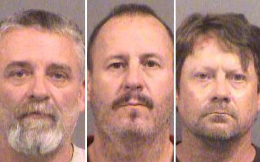 Patrick Stein (left), Gavin Wright (center) and Curtis Allen (right), seen in booking photos, have been charged with plotting to bomb an apartment building filled with Somali immigrants.
