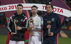 MARRAKECH, MOROCCO - DECEMBER 20: Cristiano Ronaldo (L) of Real Madrid receives the adidas Silver Ball, Sergio Ramos (C) of Real Madrid receives the adidas Golden Ball and Ivan Vicelich (R) of Auckland City FC revceives the adidas Bronze Ball after the FIFA Club World Cup Final between Real Madrid and San Lorenzo at Marrakech Stadium on December 20, 2014 in Marrakech, Morocco. Jalal Morchidi / Anadolu Agency (Photo by Jalal Morchidi / ANADOLU AGENCY / Anadolu Agency via AFP)