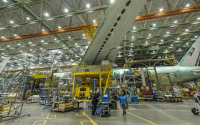 A Boeing 777 airliner sits on the production line on June 12, 2017 in Everett, Washington