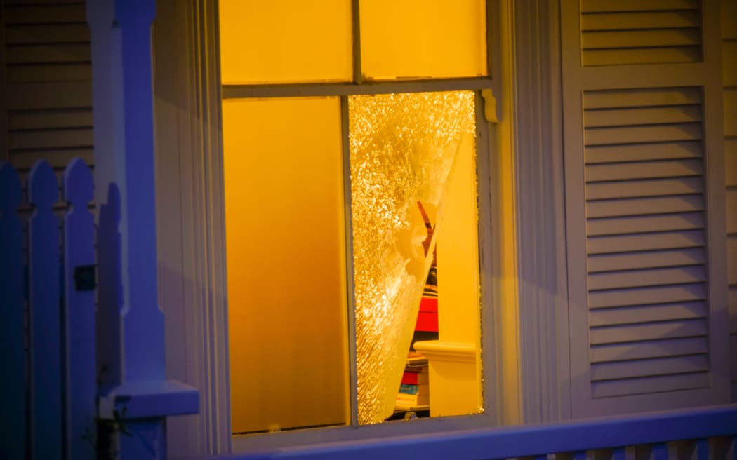 The smashed window.
