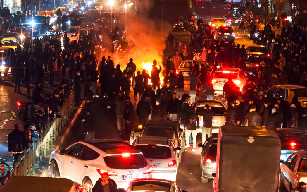Anti-government protesters demonstrate on January 8, in Tehran.