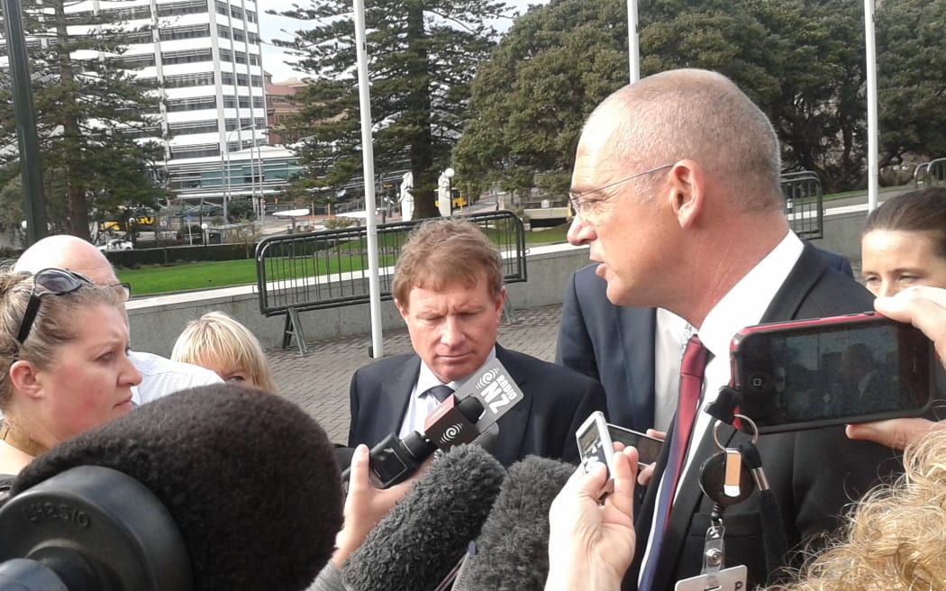 John Wilson, centre, and Theo Spierings, right, arrive at Parliament.