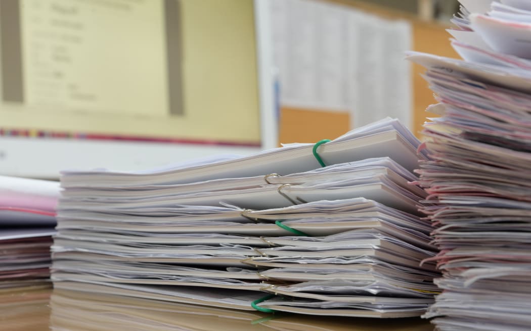 a file folder with documents and important documents
