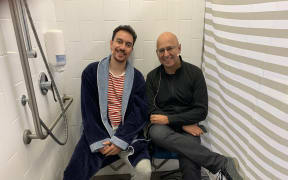 Clinical psychologist Dr Sarb Johal with host James Nokise.
