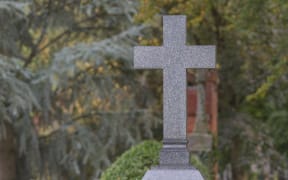 Gravestone head.