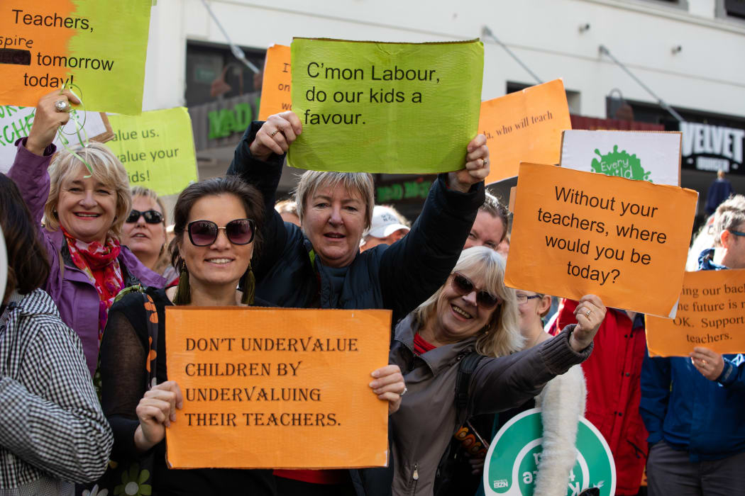 Teachers march on Queen Street in a bid for better pay rates.