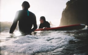 Relaxing surfers at Piha Beach (Unsplash).jpg

Tim Marshall timmarshall, CC0, via Wikimedia Commons