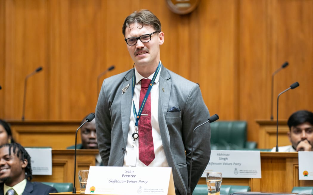 CYP delegate speaks during the first reading debate