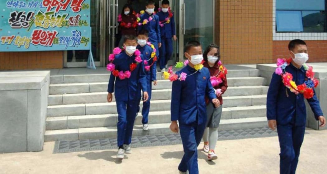 State media published photos of a ceremony for the children who allegedly volunteered.