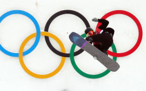 Carlos Garcia Knight from New Zealand performs a pirouette during the Snowboard Big Air finals in Pyeongchang.