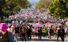 More than 15,000 protesters en route to the US Supreme Court from downtown during the Women's March Rally for Abortion Justice in Washington, DC.
