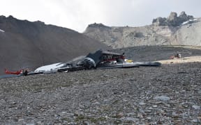 Twenty people are confirmed dead after a vintage World War II aircraft crashed into a Swiss mountainside, police reports said.