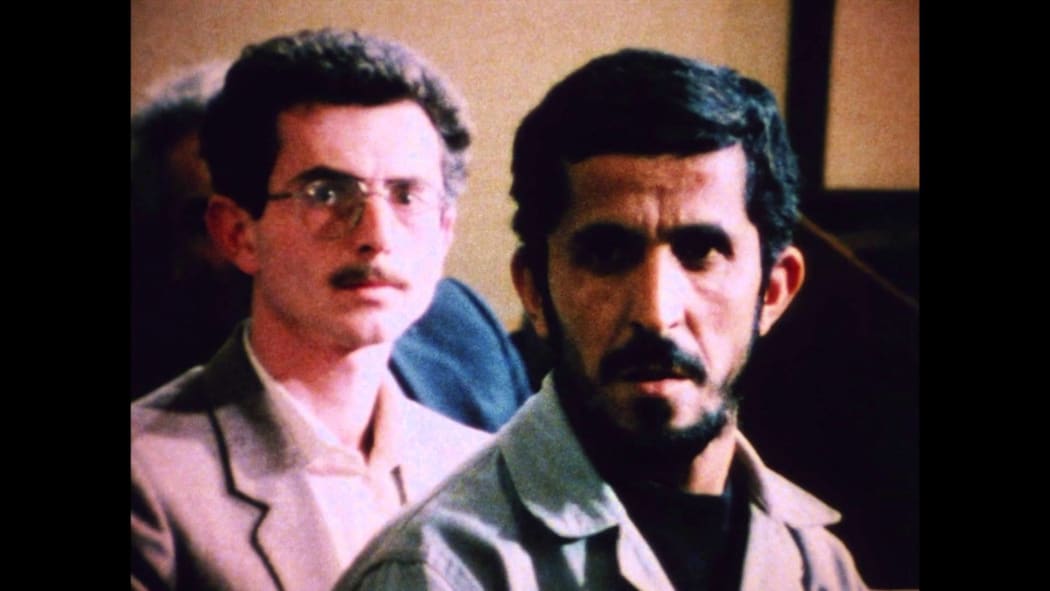 Sabzian at his (real) trial, questioned by director Kiarostami.