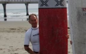 Ron Carter with his Thunderbolt Cruiser longboard