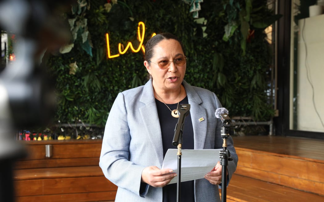 Nicole McKee makes an alcohol announcement to media