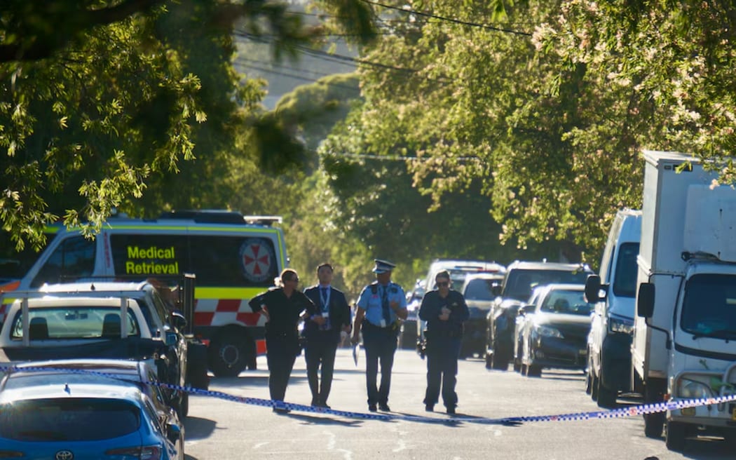 Police combing over the scene in Greenacre on Tuesday morning.