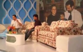 Alex on TV, before the big surprise.