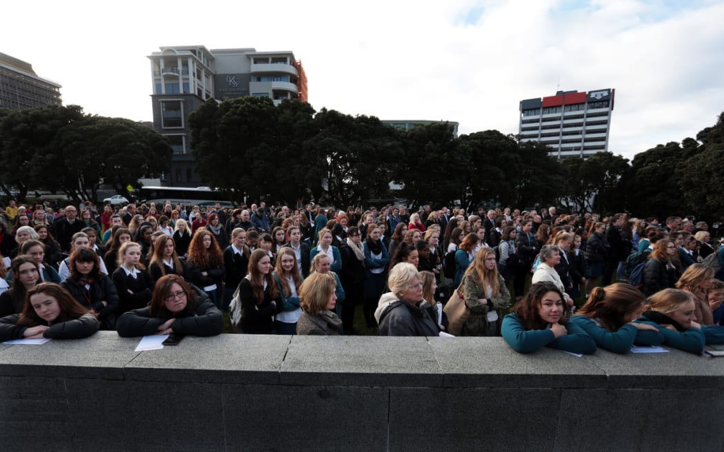 Schoolchildren were among the crowd at the ceremony at Parliament.