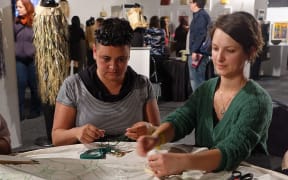 Textile artists at Toi Māori Art Market.