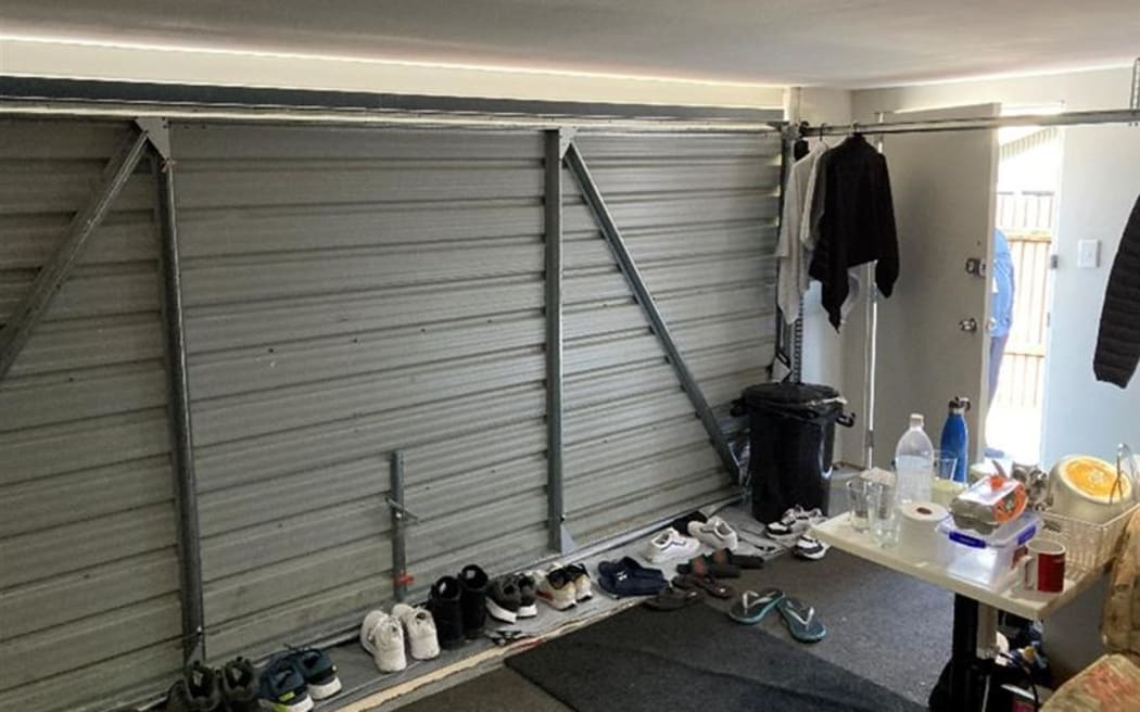 The tenant says five people living in the house's garage were evicted with a night's notice when Truong became aware of MBIE inspections.