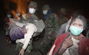 Soldiers evacuate residents in Malang, east Java.