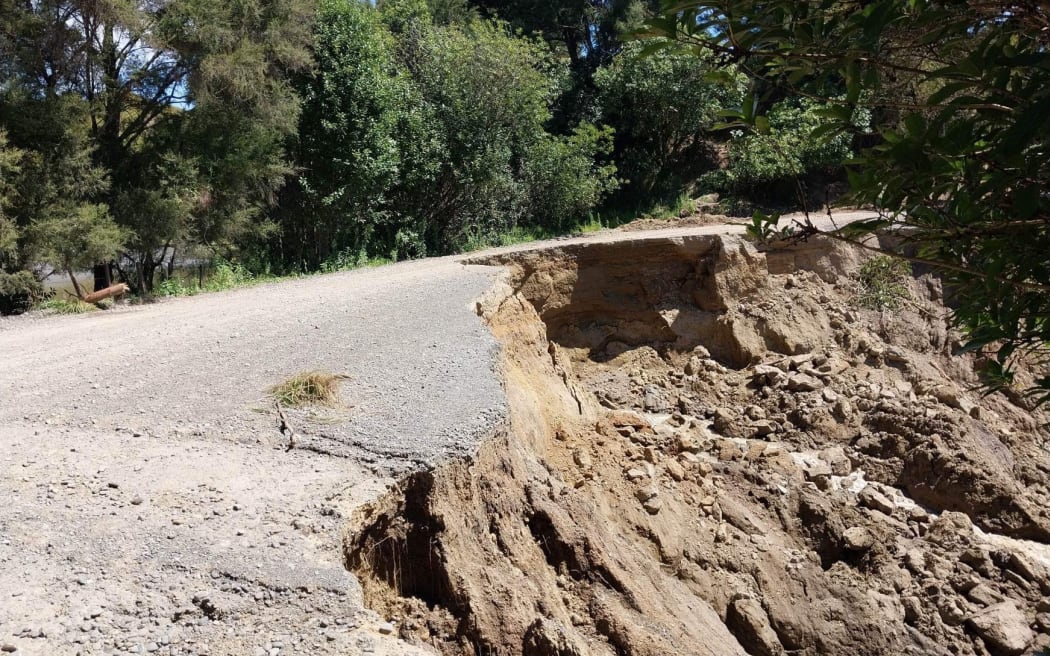 Damage on Waihau Road, where it is acting as a dam against a small lake in Dartmoor near Napier.