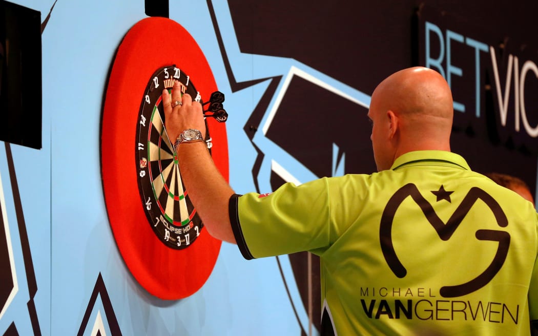 2017 World darts Champion Michael van Gerwen at the dartboard