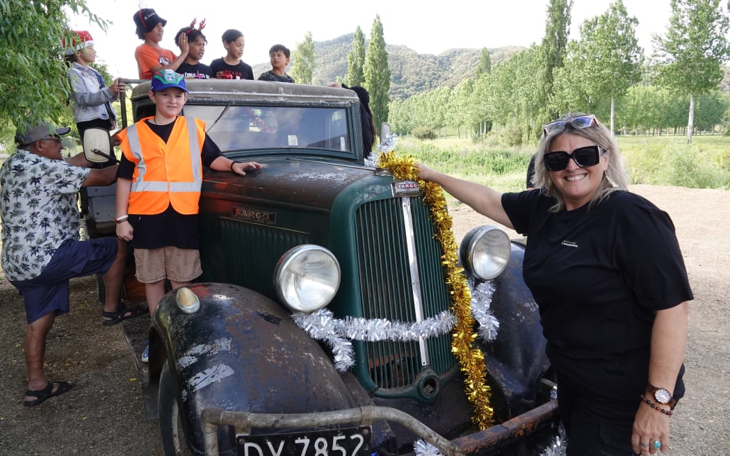 A 1933 Chrysler Fargo truck gets the tinsel treatment ahead of the parade.