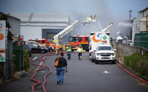 Fire trucks at the site of a blaze in Wiri that closed a main road in the Auckland suburb.