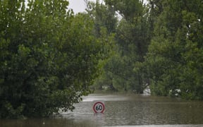 A general view of a main road under floodwaters in Richmond suburb on March 22, 2021, as Sydney braced for its worst flooding in decades after record rainfall caused its largest dam to overflow.