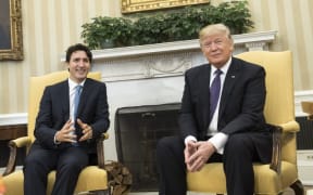 Donald Trump and Justin Trudeau meet in the Oval Office at the White House.