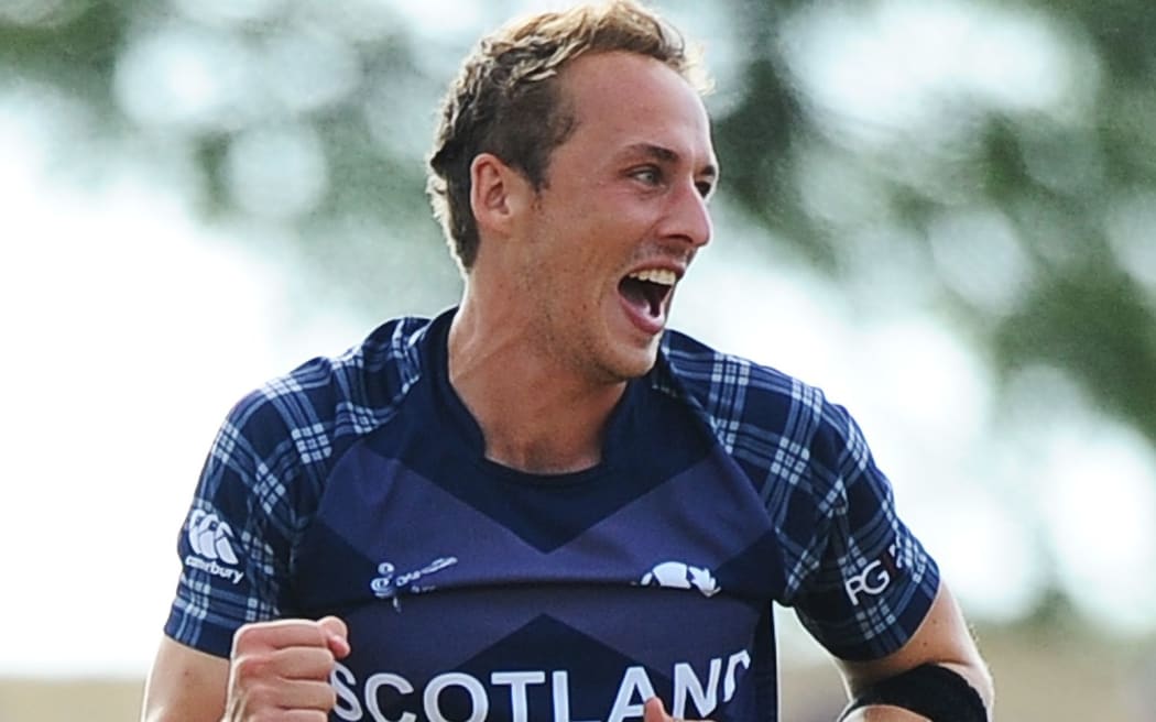 Scotland player Josh Davey celebrates taking a wicket during the 2015 ICC Cricket World Cup.